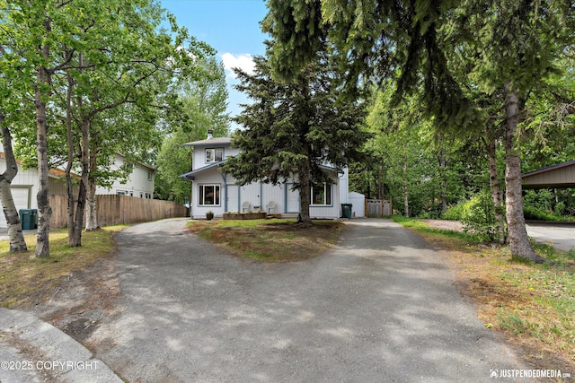 11730 Nix Ct, Anchorage, AK 99515 - view of property hidden behind natural elements featuring asphalt driveway