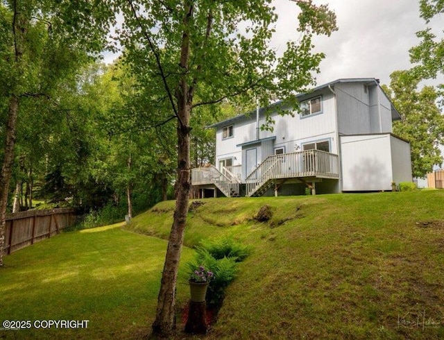 11730 Nix Ct, Anchorage, AK 99515 - rear view of property featuring stairway and a wooden deck