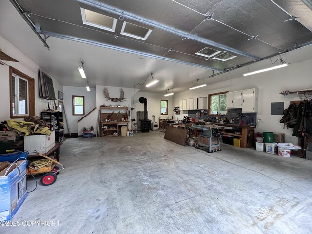34008 Orlander Ave, Seward, AK 99664 - garage with a workshop area and electric panel