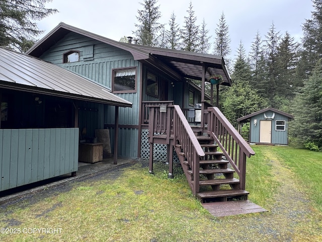 34008 Orlander Ave, Seward, AK 99664 - rear view of property with a yard