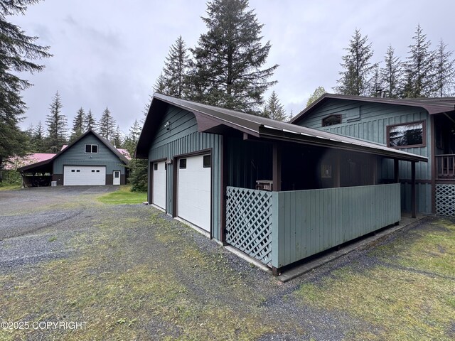 34008 Orlander Ave, Seward, AK 99664 - view of property exterior with a garage