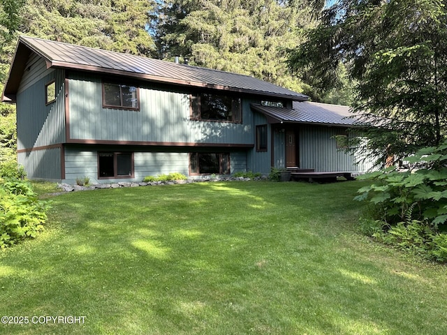 34008 Orlander Ave, Seward, AK 99664 - rear view of property with a yard and metal roof