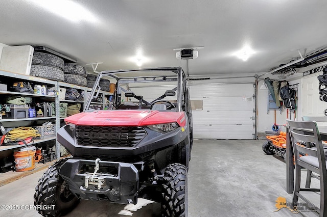 962 S Rebecca Dr, Palmer, AK 99645 - garage featuring a garage door opener
