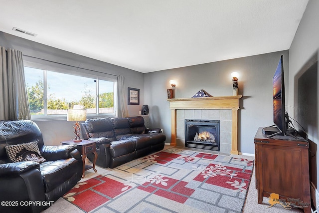 962 S Rebecca Dr, Palmer, AK 99645 - carpeted living area featuring a tile fireplace