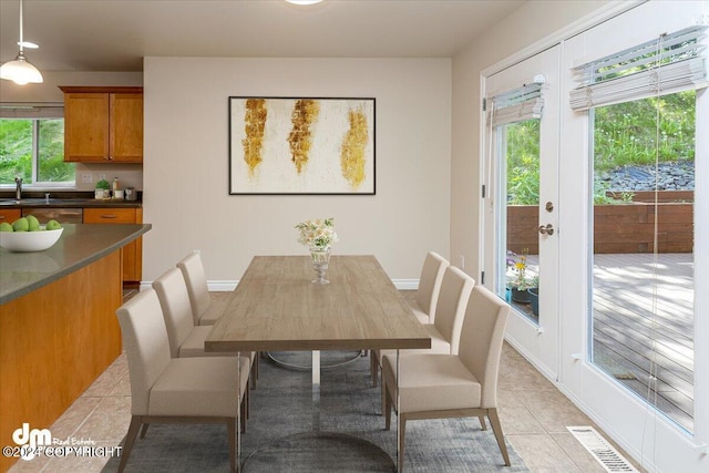 17231 Alice Loop, Eagle River, AK 99577 - dining room featuring light tile patterned floors