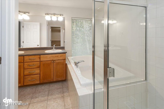 17231 Alice Loop, Eagle River, AK 99577 - bathroom with a garden tub, double vanity, a shower stall, and tile patterned flooring