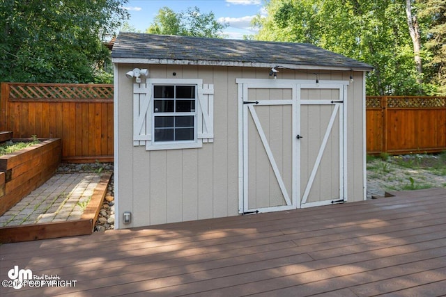 17231 Alice Loop, Eagle River, AK 99577 - view of shed featuring a fenced backyard