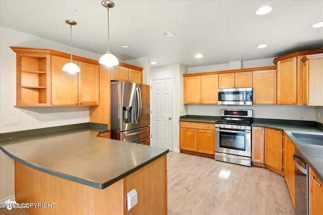 17231 Alice Loop, Eagle River, AK 99577 - kitchen featuring appliances with stainless steel finishes, dark countertops, open shelves, a peninsula, and light wood-style floors