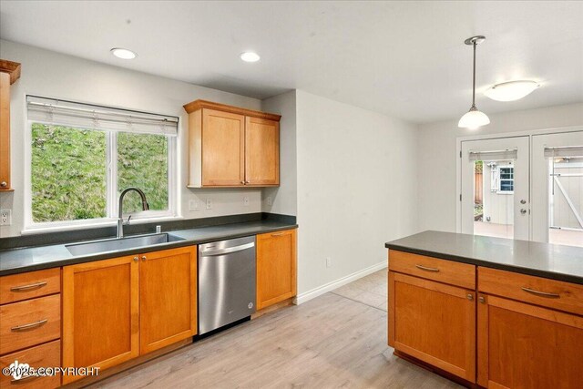17231 Alice Loop, Eagle River, AK 99577 - kitchen featuring dishwasher, dark countertops, brown cabinets, light wood finished floors, and recessed lighting