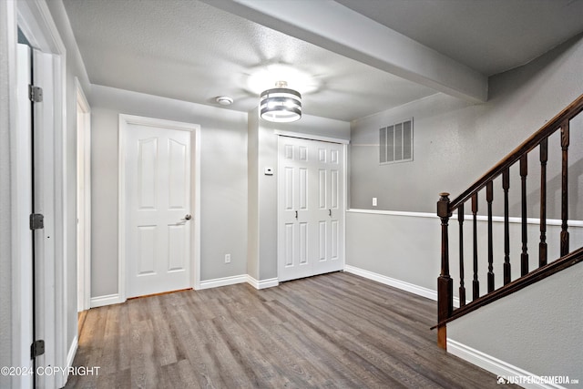 19237 Beverly Ave, Chugiak, AK 99567 - foyer with wood finished floors and stairway
