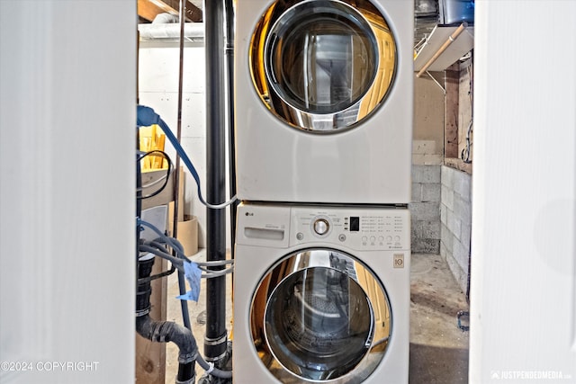 19237 Beverly Ave, Chugiak, AK 99567 - washroom featuring stacked washer / dryer