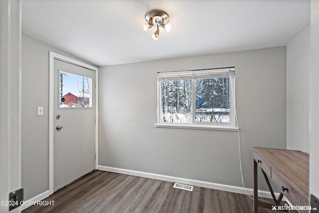 19237 Beverly Ave, Chugiak, AK 99567 - unfurnished dining area featuring wood finished floors and baseboards