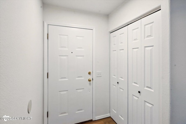 10270 Sextant Cir, Anchorage, AK 99515 - doorway to outside with dark wood finished floors
