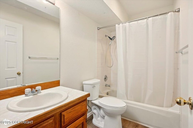 10270 Sextant Cir, Anchorage, AK 99515 - full bath with vanity, toilet, shower / bath combo with shower curtain, and wood finished floors