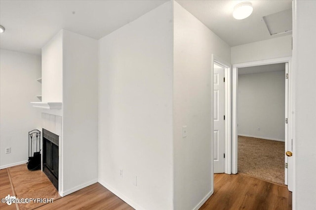 10270 Sextant Cir, Anchorage, AK 99515 - corridor with wood finished floors, baseboards, and attic access