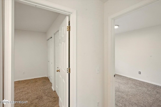 10270 Sextant Cir, Anchorage, AK 99515 - hallway featuring carpet floors and baseboards