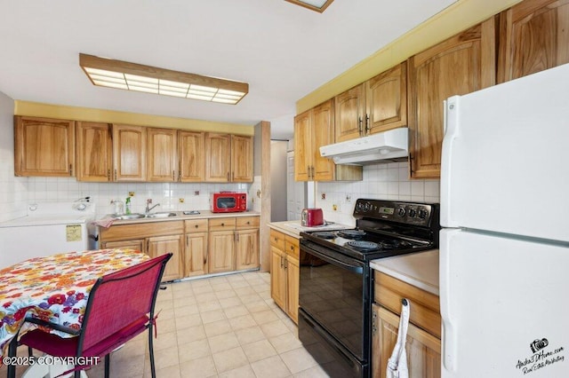 1507 Elmendorf Dr, Anchorage, AK 99504 - kitchen with white appliances, under cabinet range hood, light countertops, tasteful backsplash, and a sink