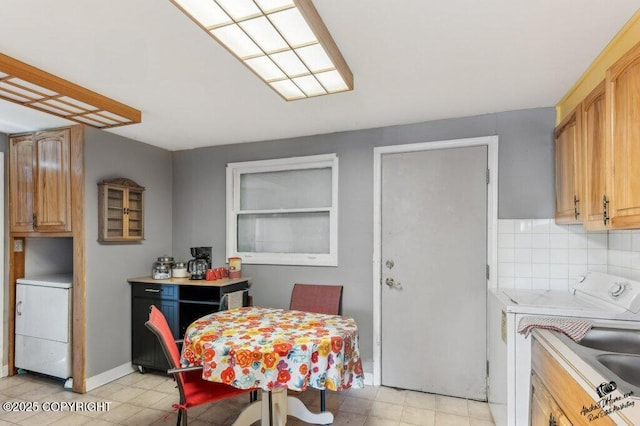 1507 Elmendorf Dr, Anchorage, AK 99504 - kitchen featuring light countertops and tasteful backsplash