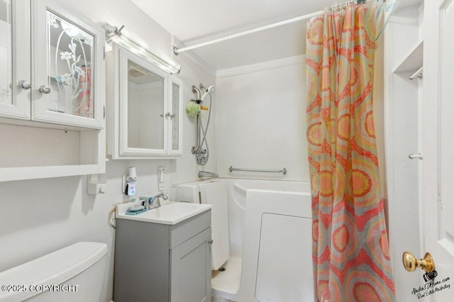 1507 Elmendorf Dr, Anchorage, AK 99504 - full bathroom featuring vanity, a shower with shower curtain, and toilet