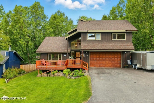 2941 Capstan Dr, Anchorage, AK 99516 - view of front facade with a garage, roof with shingles, driveway, and a deck
