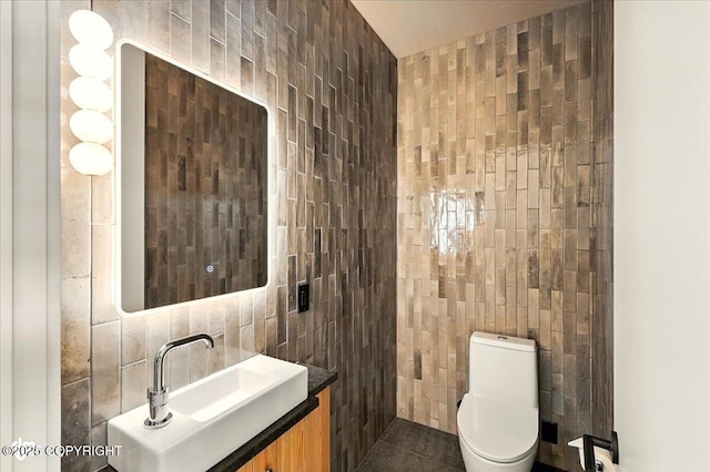 1308 Cunningham Ct, Kenai, AK 99611 - bathroom featuring tile walls, toilet, and vanity