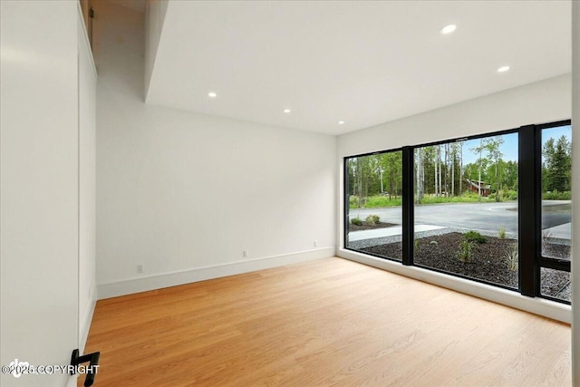 1308 Cunningham Ct, Kenai, AK 99611 - unfurnished room featuring light wood-type flooring, recessed lighting, and baseboards