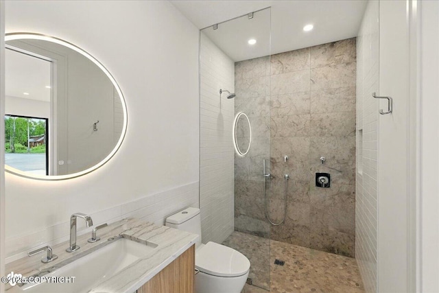 1308 Cunningham Ct, Kenai, AK 99611 - bathroom with a tile shower, toilet, vanity, and recessed lighting
