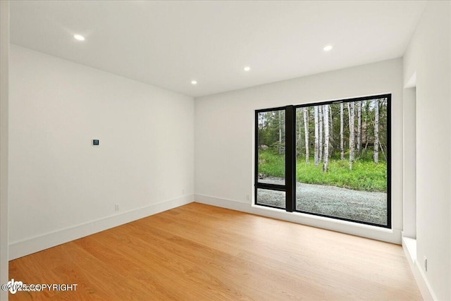 1308 Cunningham Ct, Kenai, AK 99611 - unfurnished room with light wood-style flooring, recessed lighting, and baseboards
