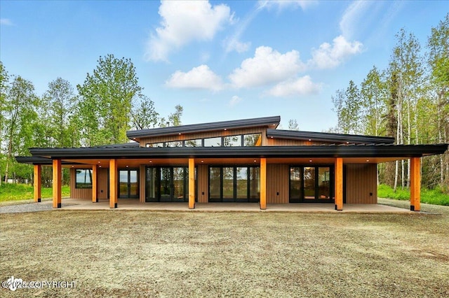 1308 Cunningham Ct, Kenai, AK 99611 - rear view of property featuring french doors