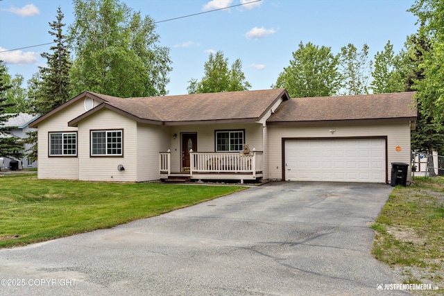4470 E Birchwood Dr, Wasilla, AK 99654 - ranch-style home with asphalt driveway, an attached garage, a porch, a front lawn, and a shingled roof