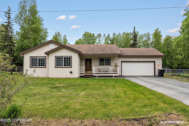 4470 E Birchwood Dr, Wasilla, AK 99654 - single story home with driveway, an attached garage, covered porch, and roof with shingles