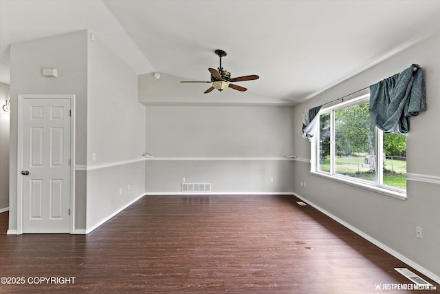 4470 E Birchwood Dr, Wasilla, AK 99654 - spare room featuring a ceiling fan, lofted ceiling, wood finished floors, and baseboards