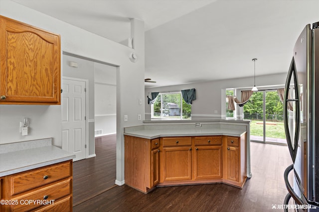 4470 E Birchwood Dr, Wasilla, AK 99654 - kitchen featuring freestanding refrigerator, dark wood-type flooring, and light countertops