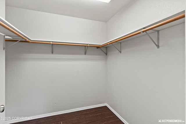 4470 E Birchwood Dr, Wasilla, AK 99654 - walk in closet featuring dark wood-type flooring