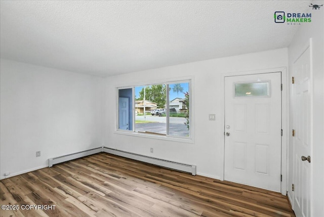 1918 Juneau Dr, Anchorage, AK 99501 - foyer with wood finished floors and a textured ceiling