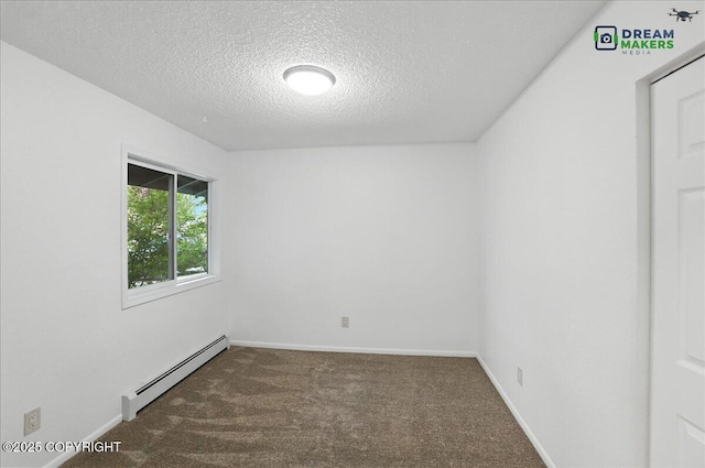 1918 Juneau Dr, Anchorage, AK 99501 - carpeted spare room featuring a baseboard radiator and a textured ceiling