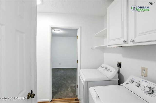 1918 Juneau Dr, Anchorage, AK 99501 - washroom with a textured ceiling, washing machine and dryer, cabinet space, and carpet