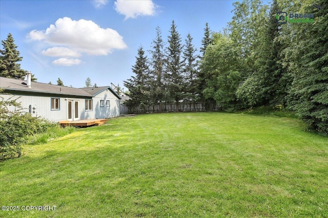 1918 Juneau Dr, Anchorage, AK 99501 - view of yard with a wooden deck