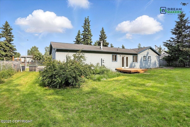 1918 Juneau Dr, Anchorage, AK 99501 - back of house featuring a deck, a fenced backyard, and french doors