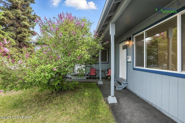 1918 Juneau Dr, Anchorage, AK 99501 - view of green lawn with entry steps