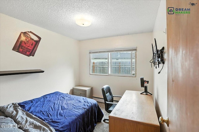 1918 Juneau Dr, Anchorage, AK 99501 - bedroom featuring carpet, a textured ceiling, a baseboard radiator, and an office area