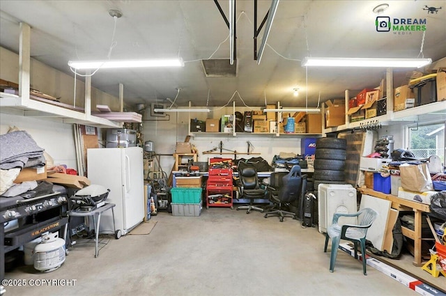 1918 Juneau Dr, Anchorage, AK 99501 - garage with freestanding refrigerator and a garage door opener