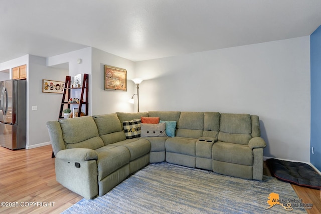 18924 Third St, Eagle River, AK 99577 - living room with light wood-style floors and baseboards
