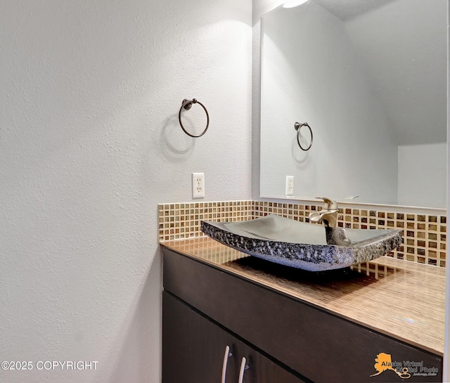 18924 Third St, Eagle River, AK 99577 - bathroom with backsplash and vanity