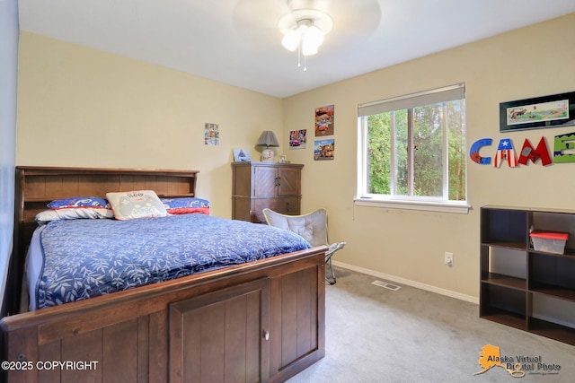 18924 Third St, Eagle River, AK 99577 - bedroom with light carpet and a ceiling fan