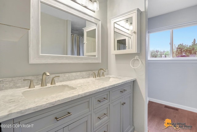 18924 Third St, Eagle River, AK 99577 - full bath with double vanity and wood finished floors