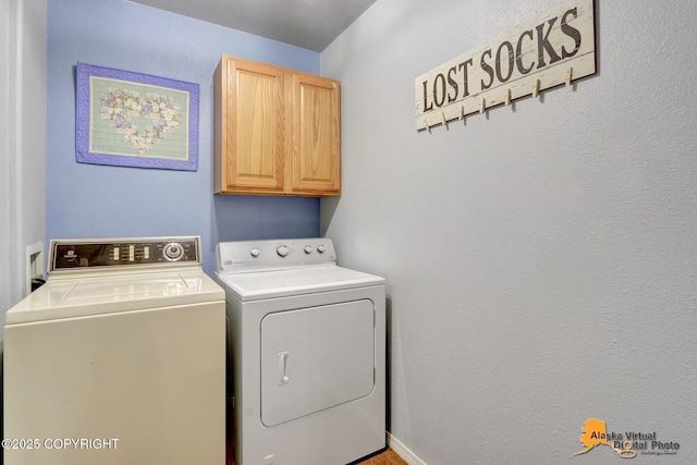 18924 Third St, Eagle River, AK 99577 - washroom with cabinet space and washing machine and clothes dryer