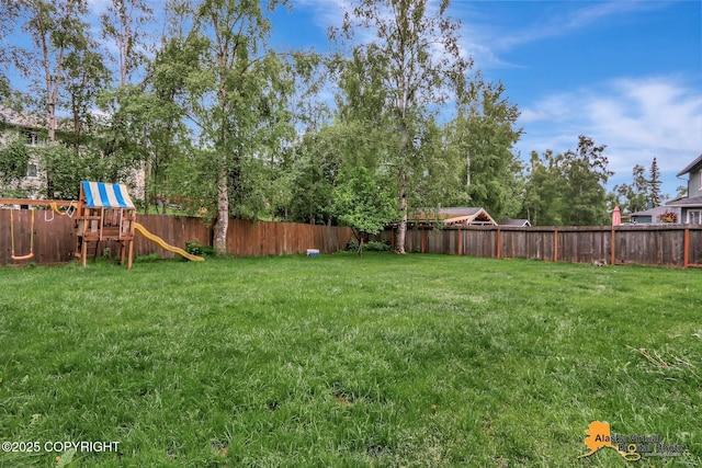 18924 Third St, Eagle River, AK 99577 - fenced backyard with a playground