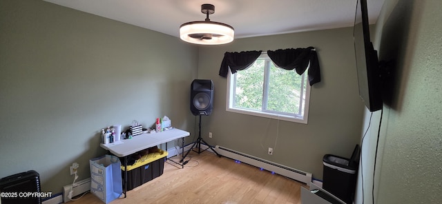 6905 Cape Lisburne Loop, Anchorage, AK 99504 - office area with a baseboard heating unit and light wood-type flooring