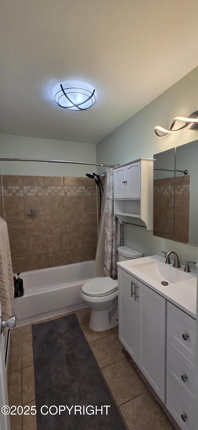 6905 Cape Lisburne Loop, Anchorage, AK 99504 - bathroom featuring tile patterned flooring, vanity, shower / tub combo, toilet, and a textured ceiling